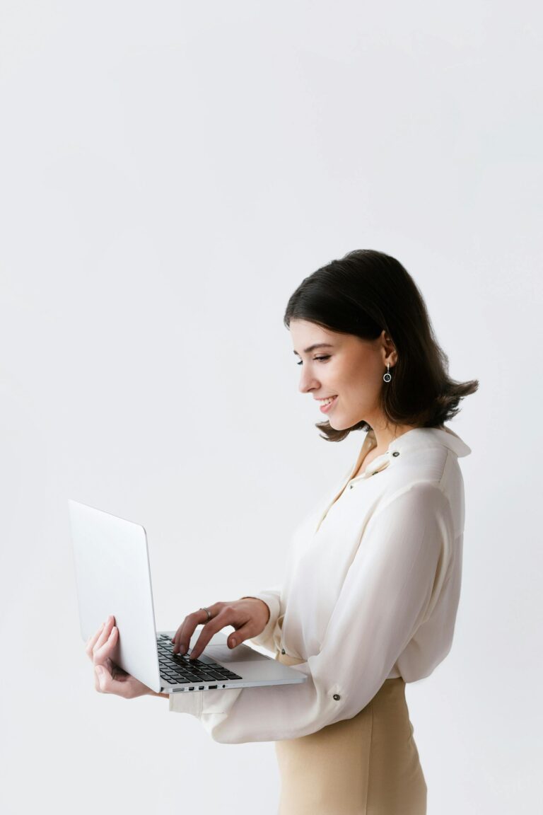 smiling woman on laptop